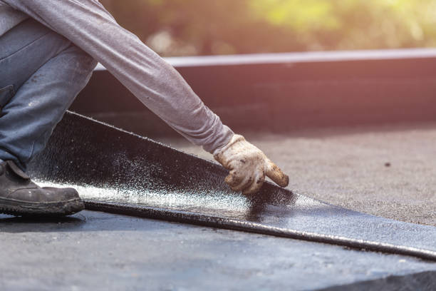 Professional Emergency Waterproofing technician working in Linden, MI